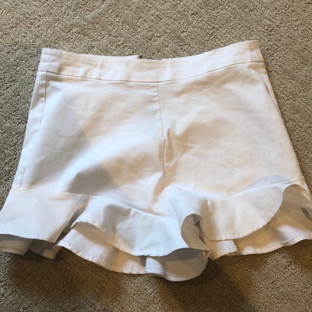 white ruffled shorts